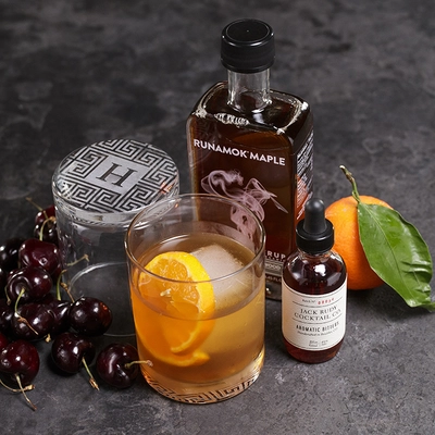 Smokin' Old Fashioned Crate includes smoked maple syrup, old fashioned glasses, ice molds, aromatic bitters, and a recipe book.