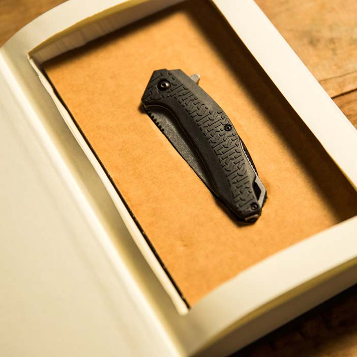 Secret Stash Folding Knife is awesome gift for men who like to hide "stuff"