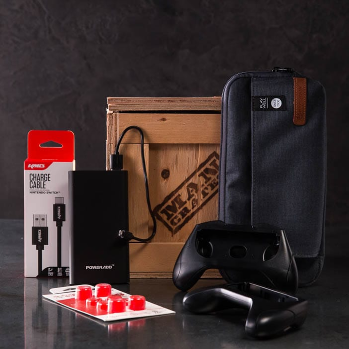 Switch Swag Crate includes charging cable, carrying case, thumb grips, rechargeable power pack, and controller handles.
