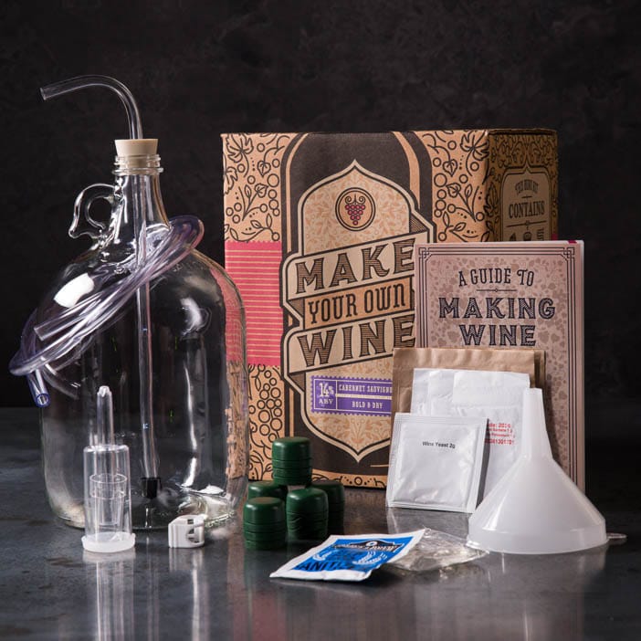 Winemaking Kit includes glass carboy, funnel, racking cane, rubber stopper, transfer tubing, tubing clamp, airlock, cabernet sauvignon juice with yeast, and a wine making book.
