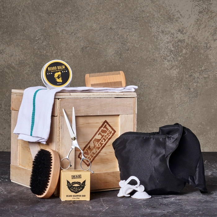 Beard Wrangler Mini Crate overhead of styling tools and products for men.