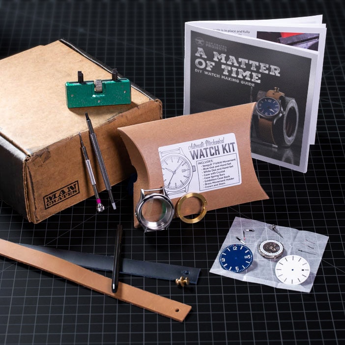 Ruler, watch components, and screwdrivers with instruction booklet for men's DIY gift.