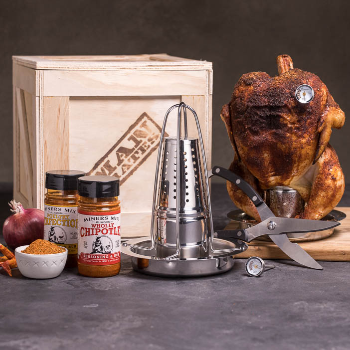 Beer Can Chicken tools and rubs with a crate and cooked chicken for a great men's grilling gift.