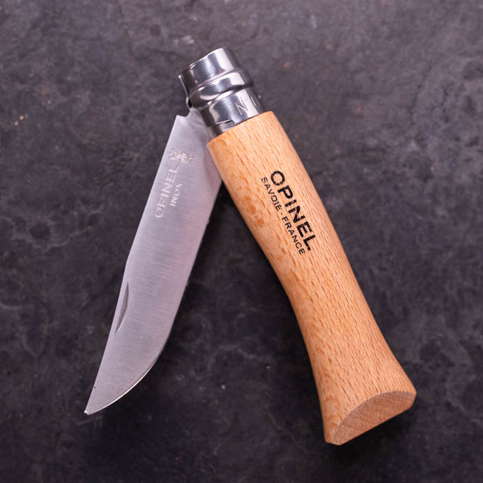 Folding Opinel Knife with wood handle for men's snack gift.