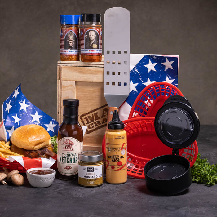 American flag themed burger basket and paper, burger press, sauces and tools for a great men's grilling gift.