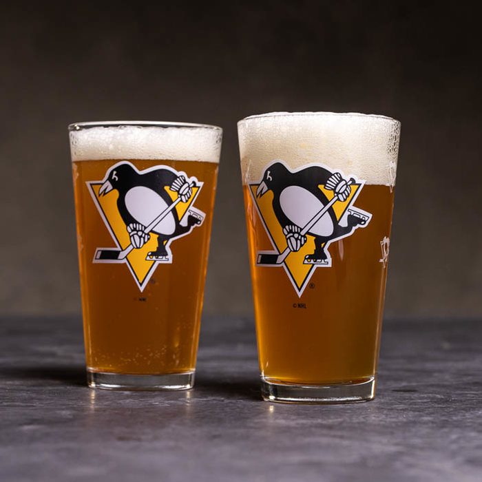 NHL logo'd glasses with coasters is a great men's sports gift.