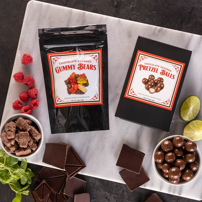 Chocolate covered pretzel balls and gummy bears are a great men's snack gift.