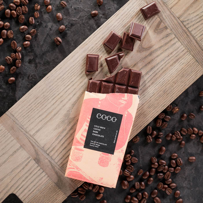 Coffee chocolate bar on a cutting board is a great men's snack gift.
