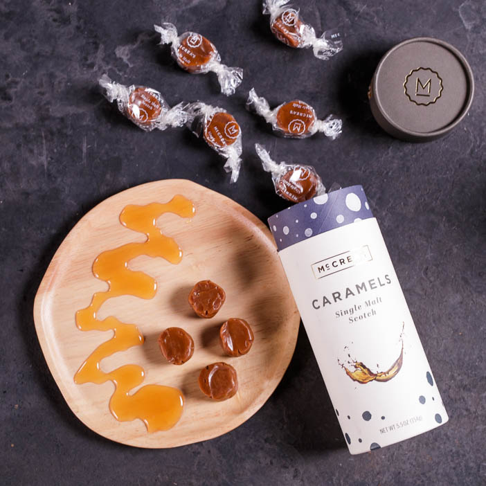 Scotch caramels spilling out of container are a great men's drink gift.