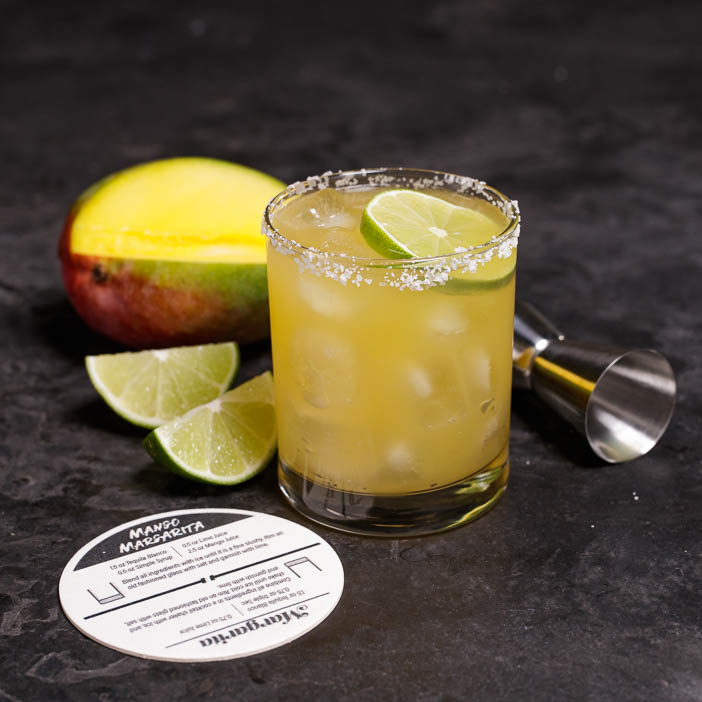 Delicious yellow cocktail and coaster is a great men's drink gift.