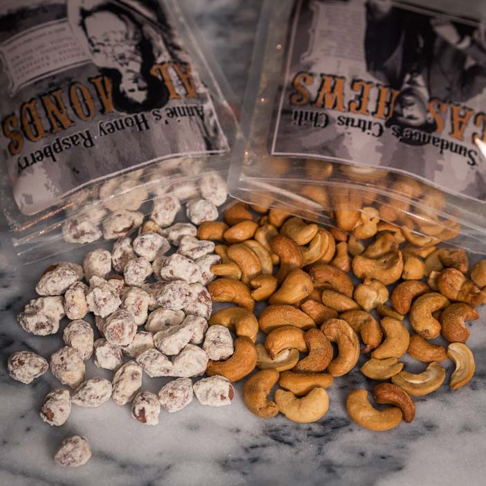 Delicious Honey Raspberry Almonds and Citrus Chili Cashews men's snack gift.