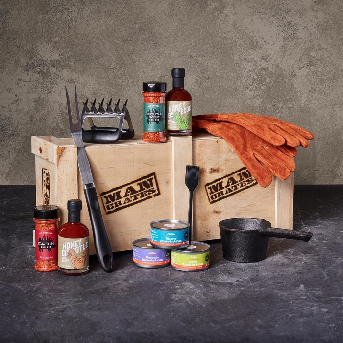 Pit Master Crate overhead view of tools and sauces grilling gifts.