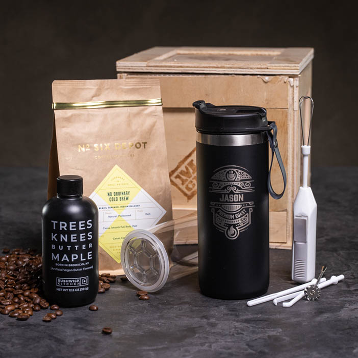 Portable French Press, stirrer, maple syrup, and coffee beans with a Crate make a great men's drink gift.