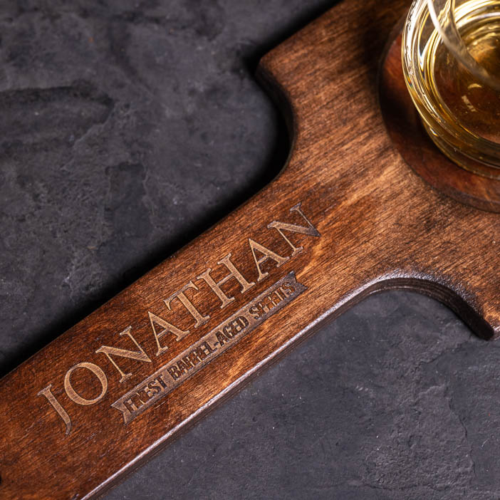 Close-up of laser-engraved personalization for a great men's whiskey gift.