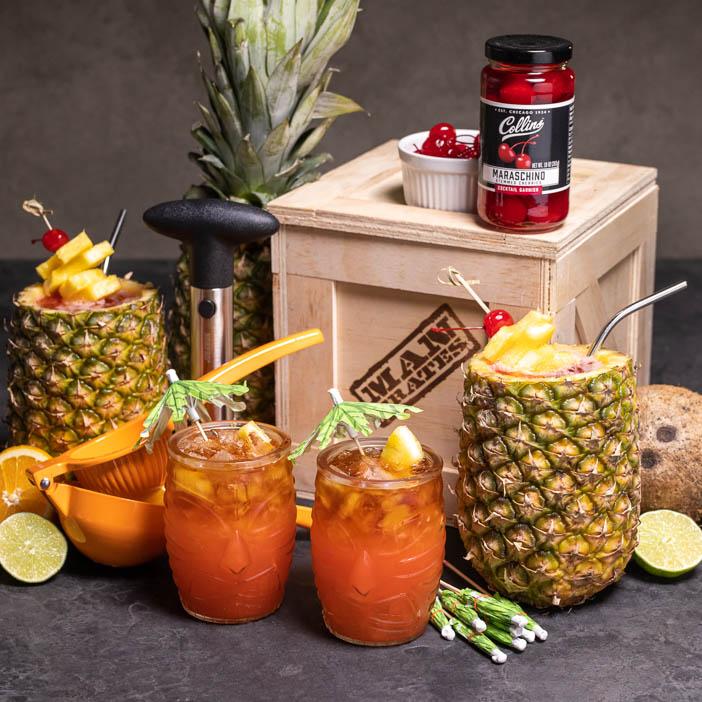 The Tropical Tiki Cocktail Crate has all the gear to make classic vacation cocktails on his very own kitchen island.