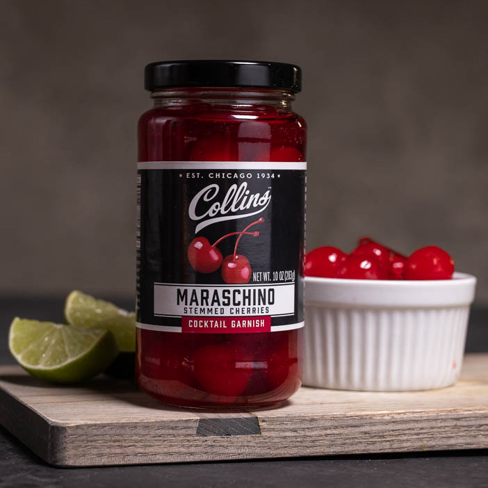 Vacation cocktail classics on his very own kitchen island, topped with Stemmed Cocktail Cherries from Collins.