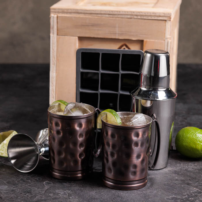 Moscow Mule Crate includes two copper mugs, silicon ice tray, cocktail shaker, and jigger.